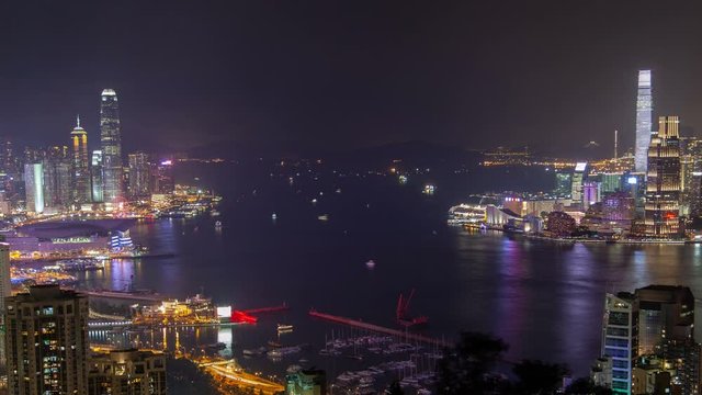 Hong Kong urban cityscape aerial skyline panorama timelapse at night pan up