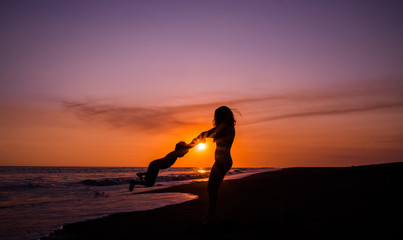 silhouette of a woman at sunset