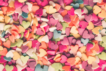 Fototapeta na wymiar Valentine's day background, multicolored hearts texture, banner