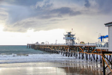 San Clemente Pier in California before a storm - obrazy, fototapety, plakaty