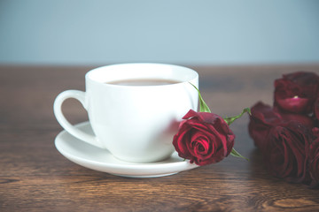 red rose and cup of coffee