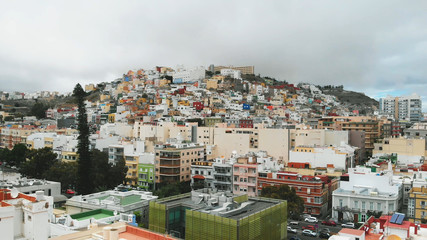 Fototapeta premium Aerial view of Las Palmas de Gran Canaria - beautiful bird's eye view of the old town on the hill. Spanish architecture, colorful city