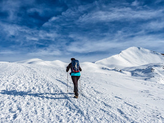 Fototapeta na wymiar Mountaineering scene in the alps during winter