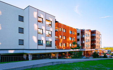 Apartment in residential building exterior. Housing structure at blue modern house of Europe. Rental home in city district on summer. Architecture for business property investment, Vilnius, Lithuania.