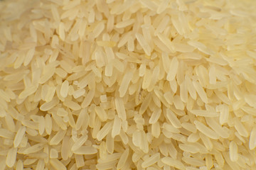 Long grain white rice background. Macro, closeup. Rice texture. Top view.