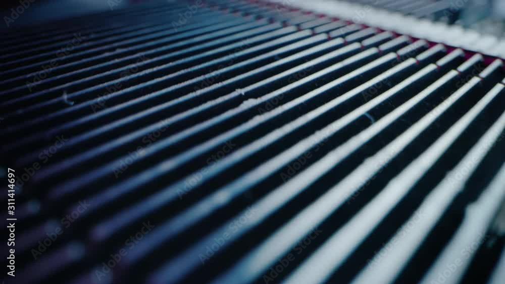 Poster close-up moving macro shot: inside of computer case. camera moves over pcb motherboard, showing heat