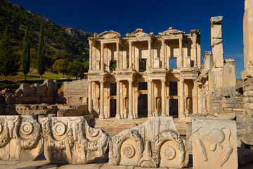 View of ruins surrounding the Library of Celsus from the Marble Street in ancient Ephesus Turkey