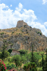 Fototapeta na wymiar View from below to walls of old Palamidi fortress, Nafplio, Peloponnese, Greece