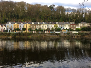 Fototapeta na wymiar Houses by the riverside of River Lee, in Sunday's Well, Cork city, Ireland