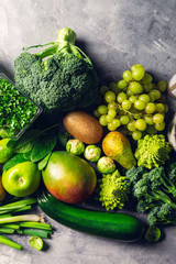 Variety of Green Vegetables and Fruits on the grey background