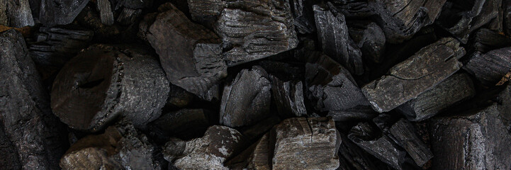 black coal background. charcoal woody black.  lot of wood