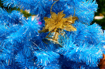 Photo of christmas tree decoration for new year and christmas. Bright lights and colors, festive mood. The concept of a happy meeting of Christmas and New Year.