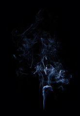 Photo of real white smoke on black background