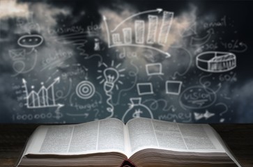 Open vintage christian bible on background