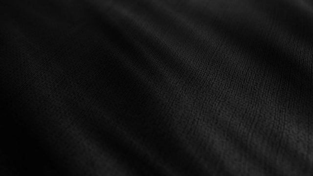 Black fabric cloth material is wave. Fashion pattern, detailed burlap. 