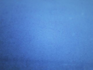  close-up of decorative abstract wall surface with blur / bokeh effect in classic blue color