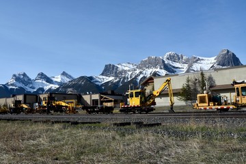 A work train replaces railroad ties in the Canadian Rockies