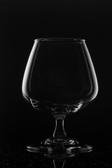 Glass empty wine glass on dark background