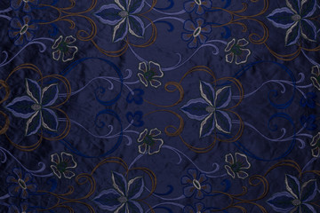 Overview of blue fabric with floral pattern and textile texture background