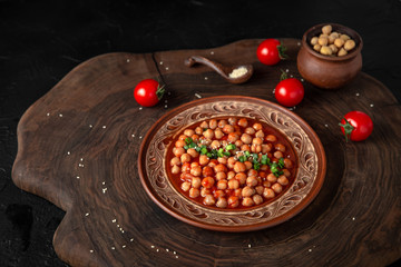 Healthy Chickpeas beans with tomato sauce. Vegetarian food. Source of protein.