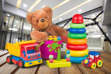 Many colorful toys collection on mall background
