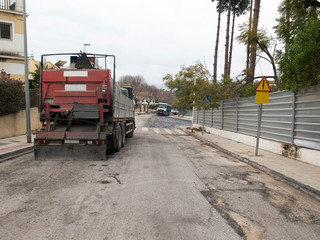 Maquinaria de asfalto de pavimento en ciudad