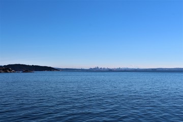 Vancouver Skyline from fairy on the sea to Vancouver Island. Beautiful landscape. View from boat