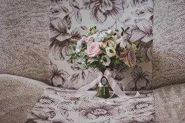 Bouquet of flowers on a beautiful sofa 2359.