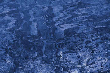 Trend color 2020 classic blue, top view, layout for design. Mountain texture in trendy blue color.
