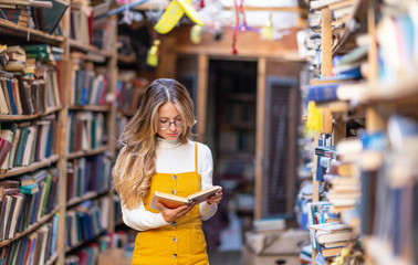 girl and book flea market