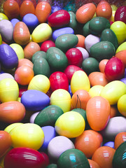 Fototapeta na wymiar Multicolor plastic easter eggs with shell open use for egg hunting, lucky draw boot.