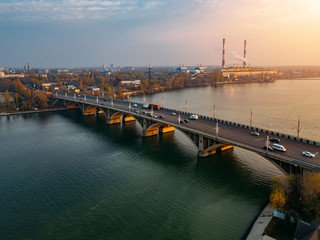 Evening autumn Voronezh. Sunset above Vogresovsky bridge over Voronezh river, aerial view