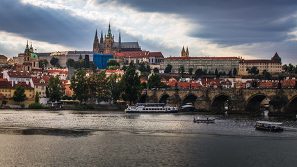 Old town of Prague over river Vltava with Saint Vitus cathedral on skyline. Praha panorama landscape view
