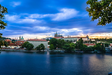 Fototapeta na wymiar Old town of Prague over river Vltava with Saint Vitus cathedral on skyline. Praha panorama landscape view