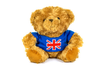Teddy bear with UK flag on white background
