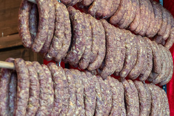 Flat sausages on farmer's market in Vienna, Austria. Lukanka salami
