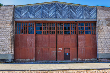 Fototapeta premium Old desolate hall building in the area of Daugavpils Fortress in Daugavpils city, Latvia