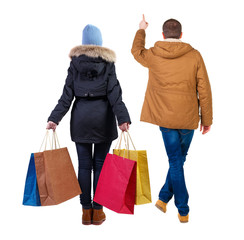 back view of couple with shopping bags