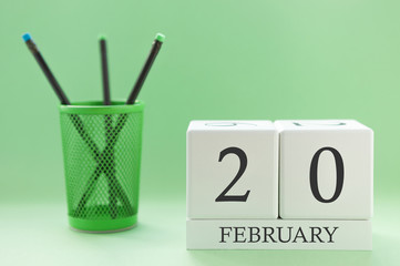 Desk calendar of two cubes for February 20