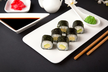 Maki rolls with avocado and unagi sauce. Sushi menu. Japanese food. 