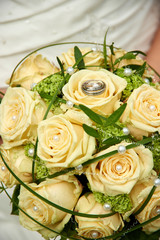 wedding bouquet with roses and rings