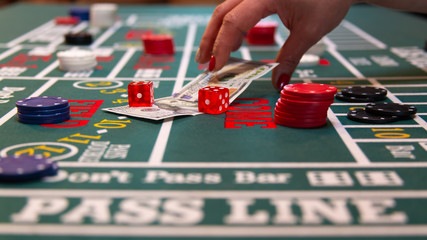 Betting $100 cash on the craps casino table