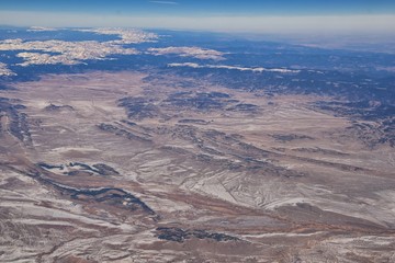 Colorado Rocky Mountains Aerial panoramic views from airplane of abstract Landscapes, peaks, canyons and rural cities in southwest Colorado and Utah. United States of America. USA.