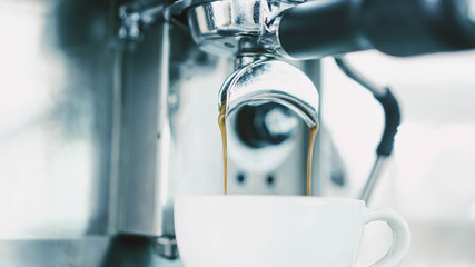 Barista attaching portafilter to the apparatus,Coffee Chill Concept