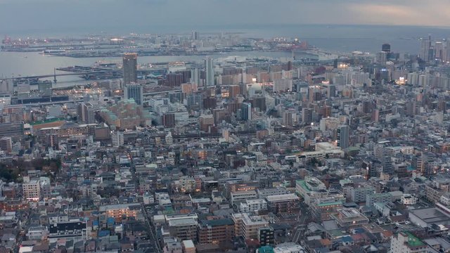 4k Pan over Kobe, Japan. Aerial View of City in early evening