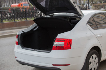 Fototapeta na wymiar Car with open trunk