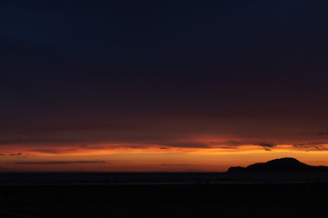 Fototapeta premium orange sunset in the mountains
