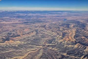 Colorado Rocky Mountains Aerial panoramic views from airplane of abstract Landscapes, peaks, canyons and rural cities in southwest Colorado and Utah. United States of America. USA.