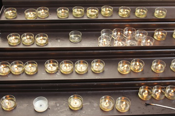 Lit up prayer candles in a church in St. Gallen, Switzerland.