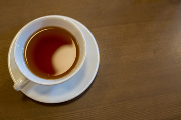 top view of a cup of golden oolong tea